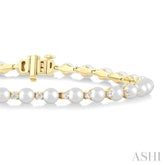 4 MM Cultured Pearl and 3/4 Ctw Round Cut Diamond Tennis Bracelet in 14K Yellow Gold